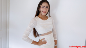 Gorgeous Ladyboy posing in tight white dress