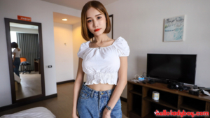 Shy Ladyboy posed fully clothed in her debut for helloladyboy.com
