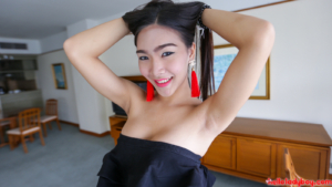 Busty XXX model gets playful on her first hardcore photo and video shoot