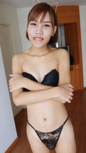 Slender sexy Natty poses in her black bra and panties