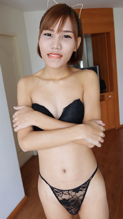 Slender sexy Natty poses in her black bra and panties