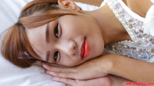 Pretty and passable Ladyboy smiles for the camera at helloladyboy