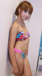 Sweet and petite teen Unicorn models in her bikini for your horny eyes.